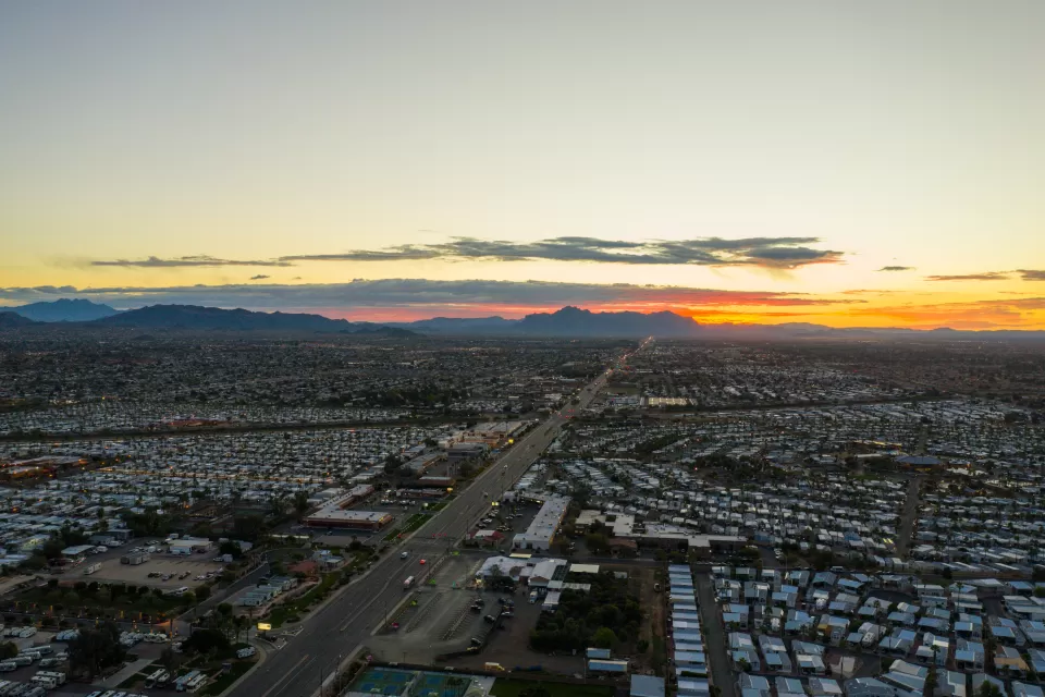 Aerial view of mobile home park next to freeway in Mesa, Arizona